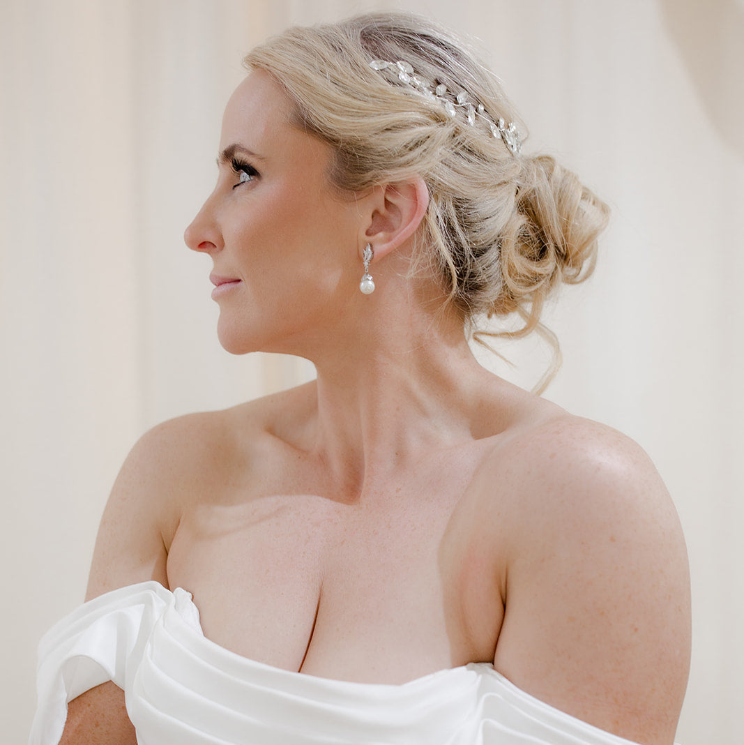 Bride with silver crystal hair accessories.