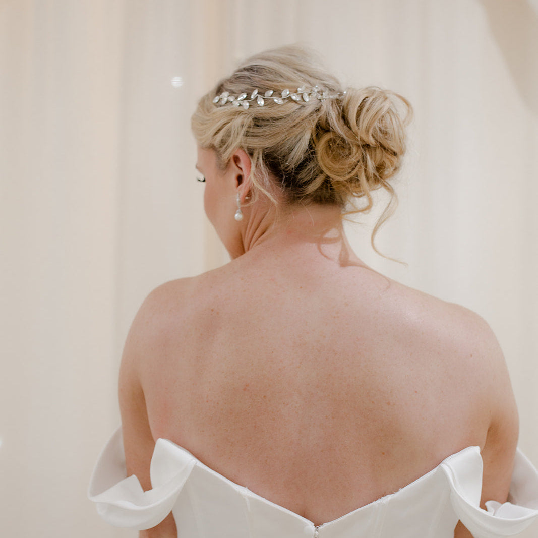 Bride wearing silver EJ.Edit crystal hair vine.